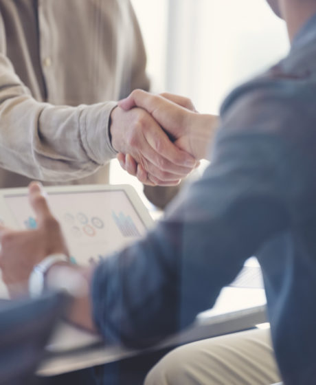 Close up of Businessmen shaking hands.